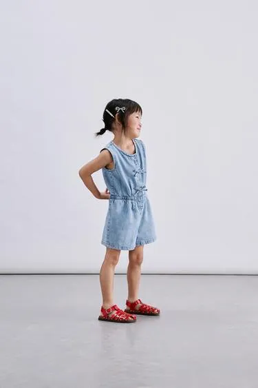 DENIM SHORT JUMPSUIT WITH BOWS