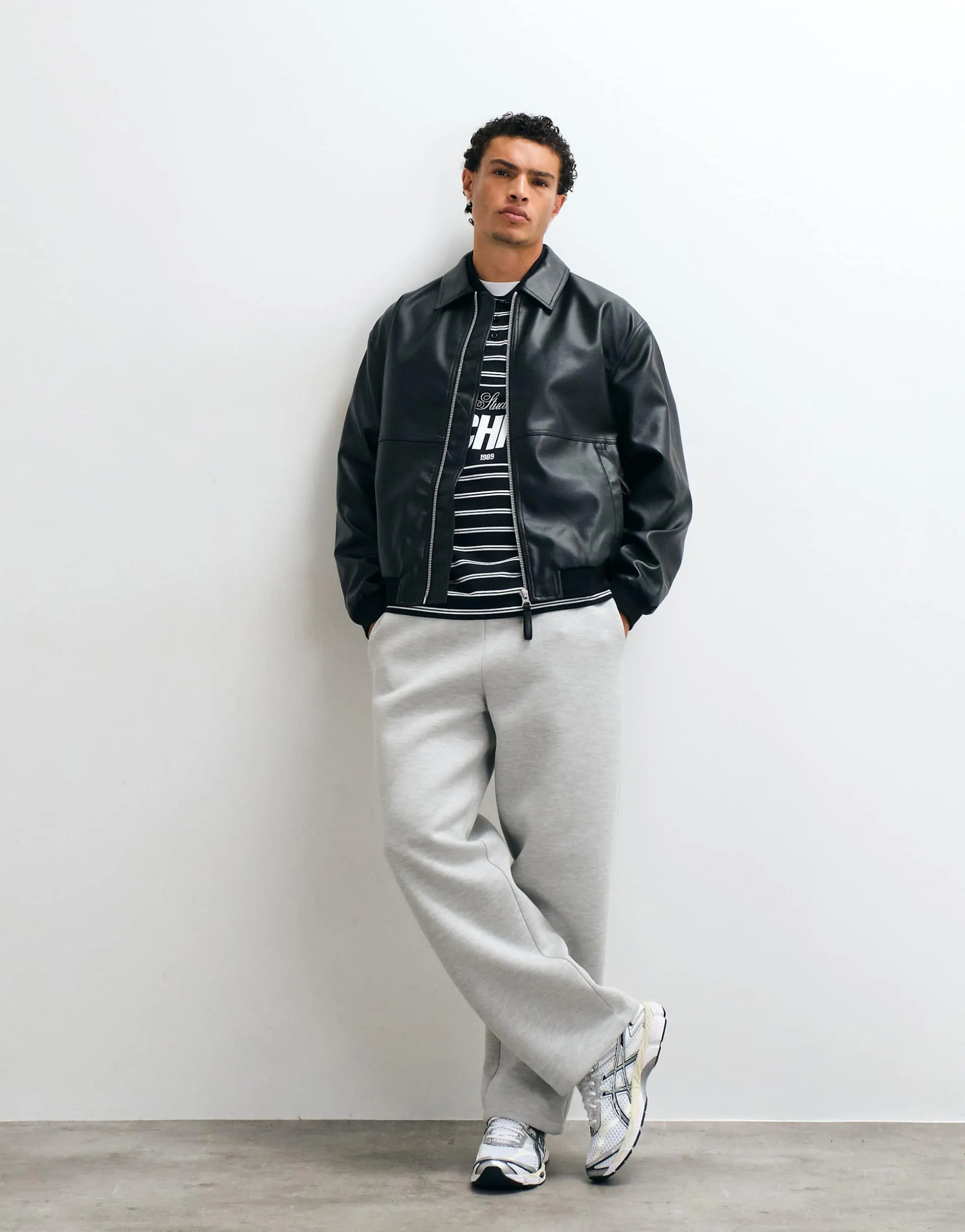 ASOS DESIGN faux leather oversized bomber in black