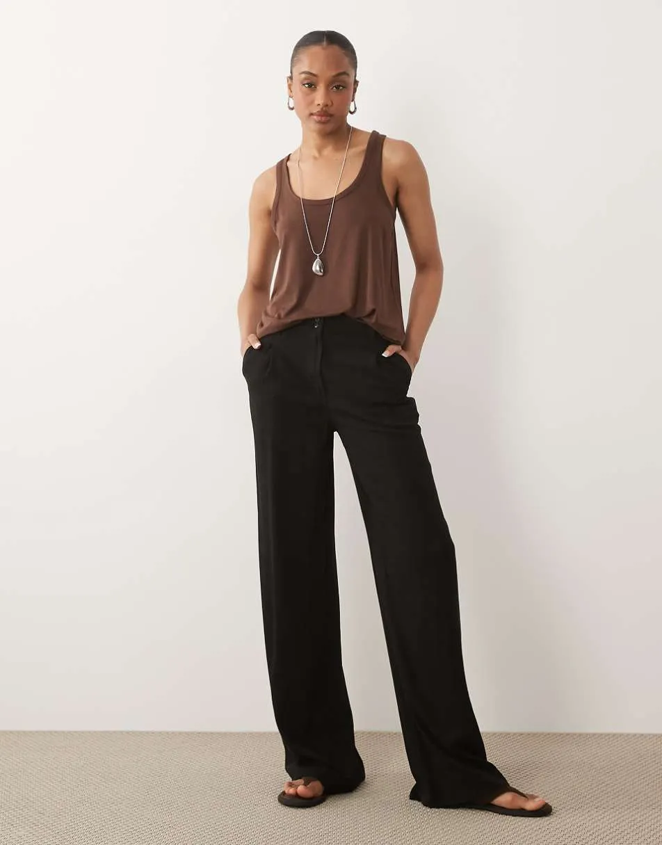 ASOS DESIGN Tall wide leg trousers with pleat detail in linen blend in black