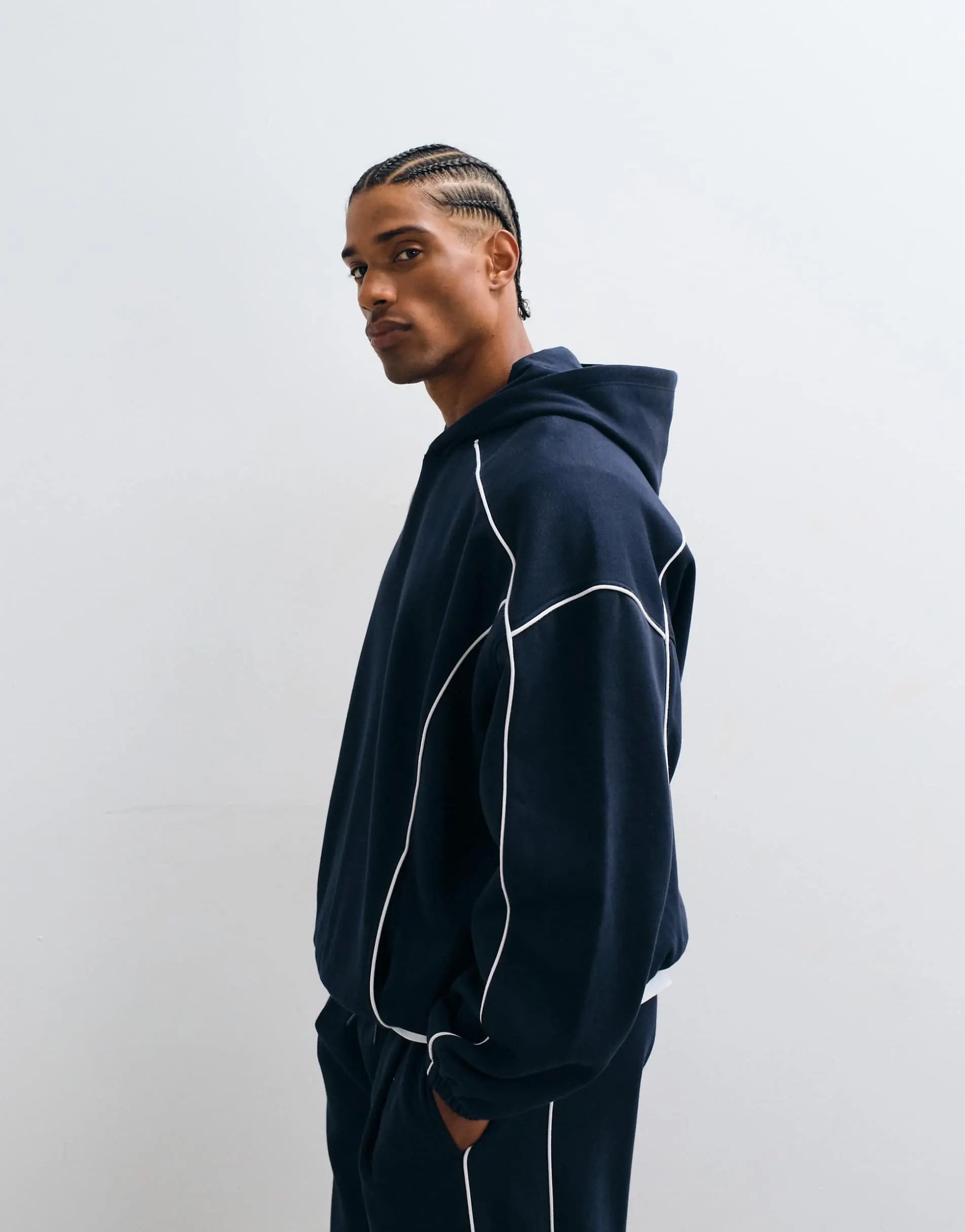 ASOS DESIGN extreme oversized hoodie with white piping in navy