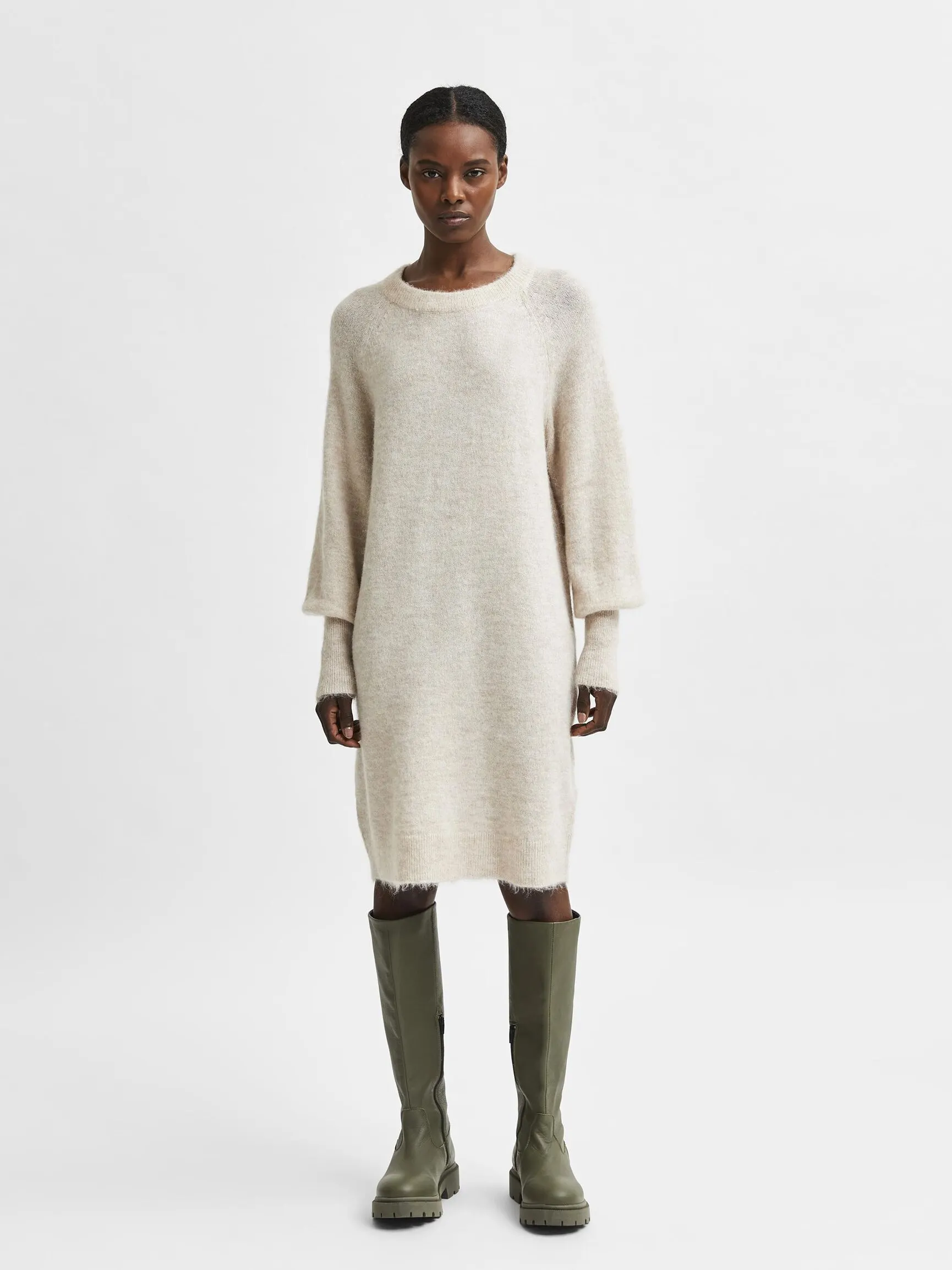 LANGERMET STRIKKET KJOLE