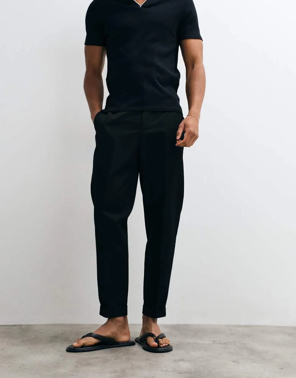 ASOS DESIGN smart tapered trousers in black with elasticated waist and turnup