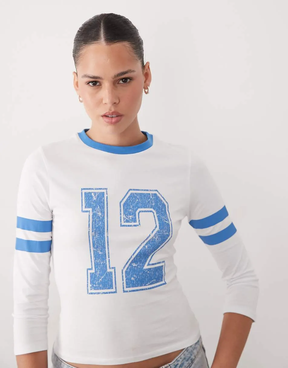 ASOS DESIGN 3/4 sleeve baby tee with varsity graphic in ecru and blue