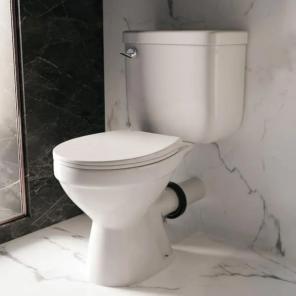 MaceratingFlo Compact 16.​5 in.​ Rear Discharge Toilet 2-​Piece White, 7 in.​ Rough-​In Round Bowl, 1.​6 GPF, 2 Extension Pipes Included