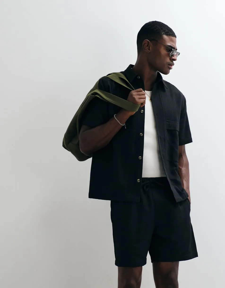 ASOS DESIGN co-ord textured shorts in mid length in black