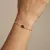 Armband in edelstaal, schelp en kralen