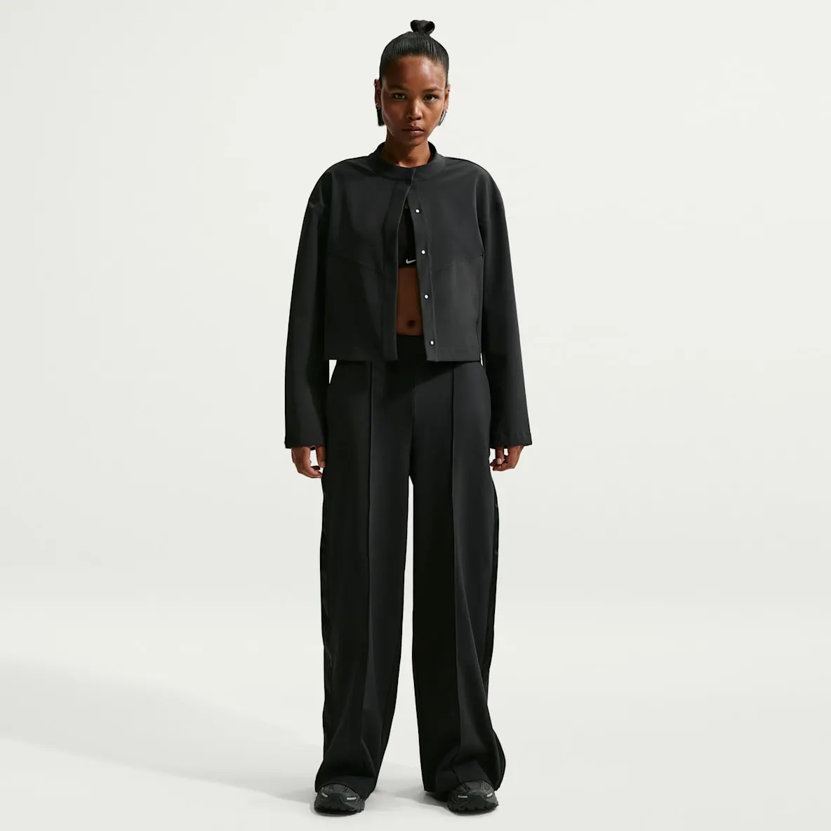 Dri-FIT ledigsittende bukse med høyt liv og vide ben til dame