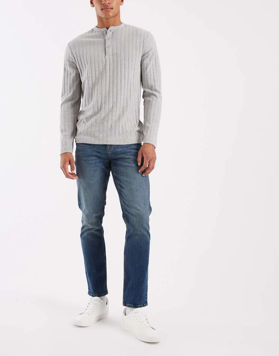 ASOS DESIGN slim jeans in mid wash blue