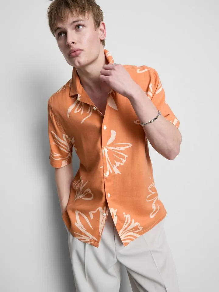 Chemise balnéaire à fleurs abstraites