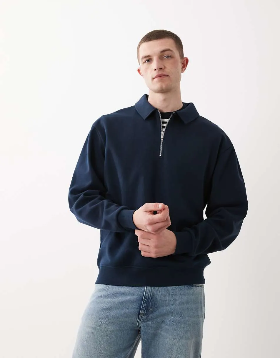 ASOS DESIGN relaxed 1/4 zip sweatshirt with collar in navy