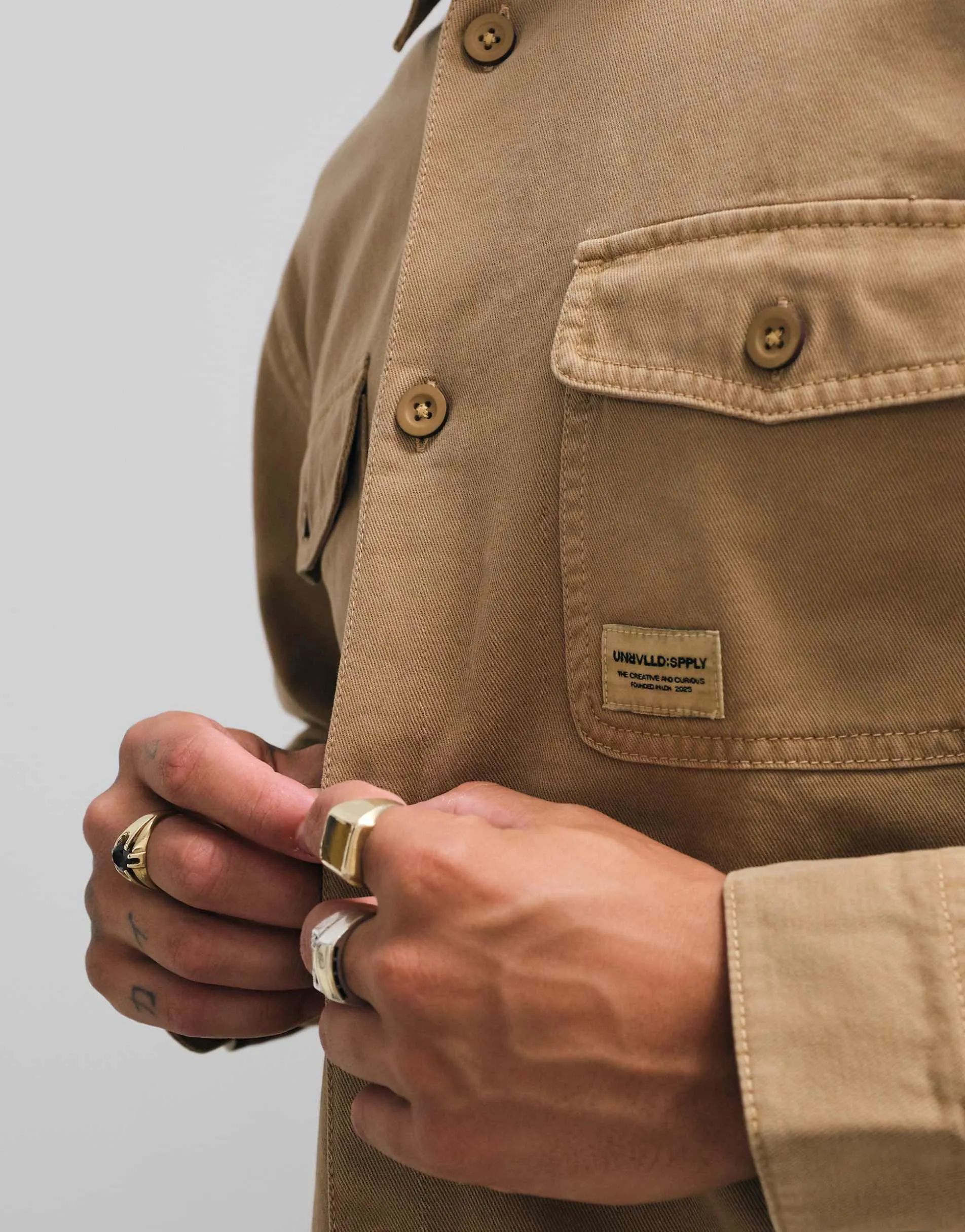 ASOS DESIGN cotton twill overshirt with badge in beige