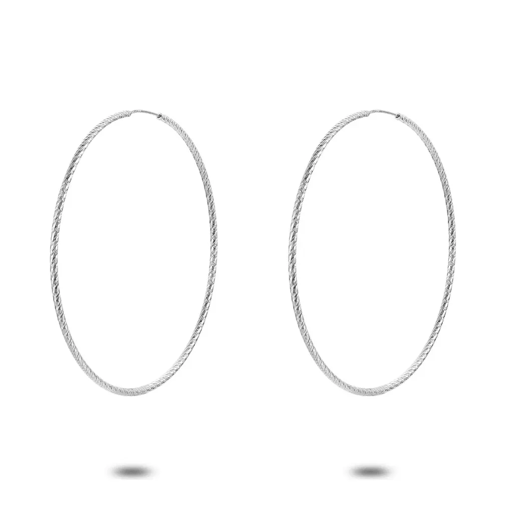 Oorbellen in zilver, gebeiteld, 38 mm