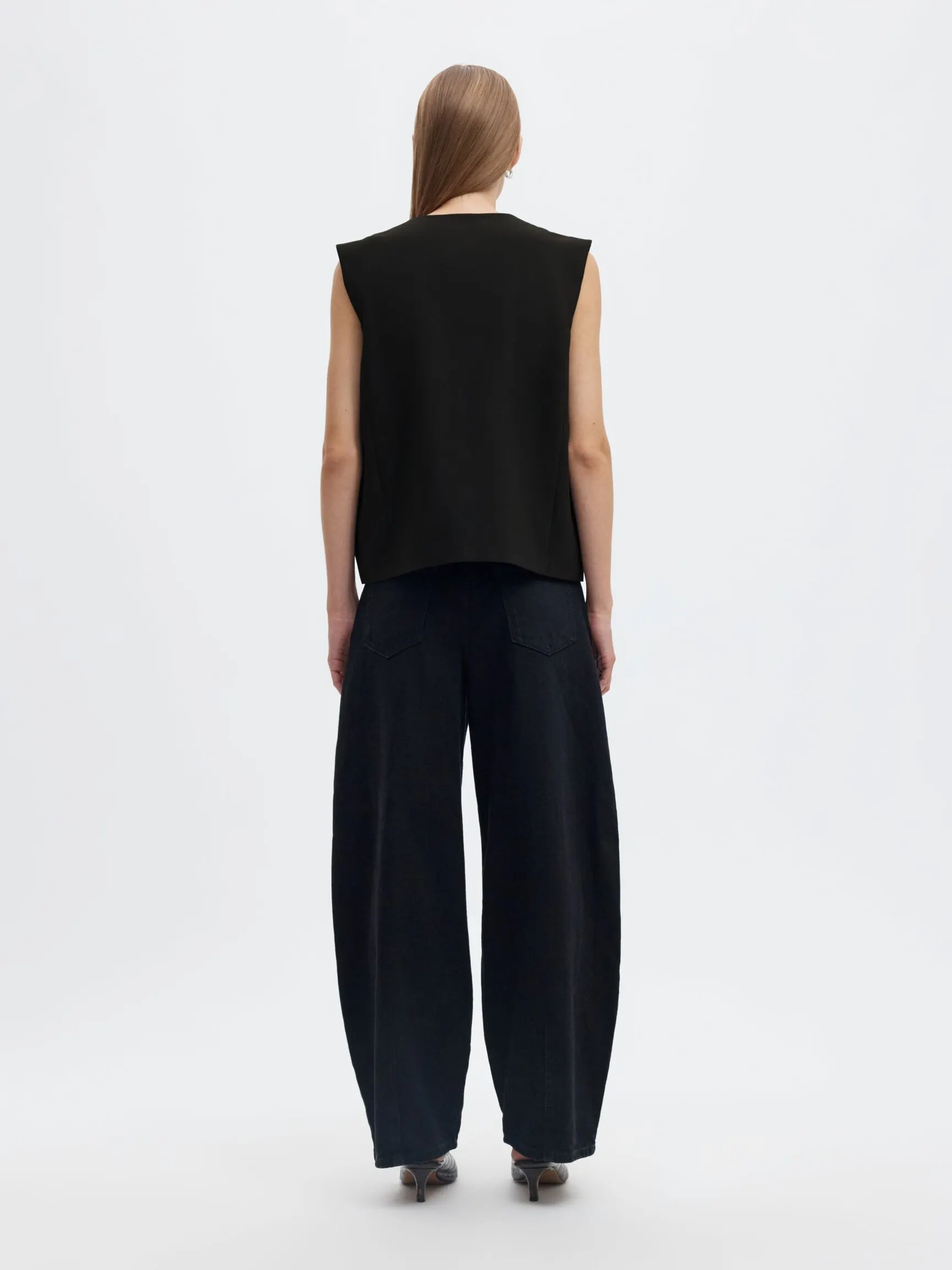 ASYMMETRISK VEST
