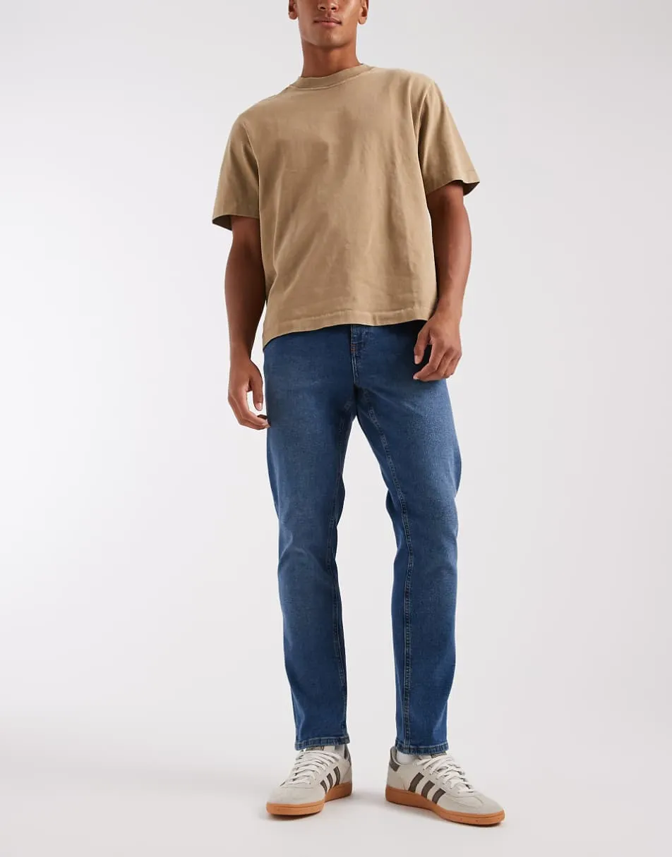 ASOS DESIGN slim jeans in light wash blue