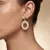 Oorbel in high fashion, ovaal met witte elementen