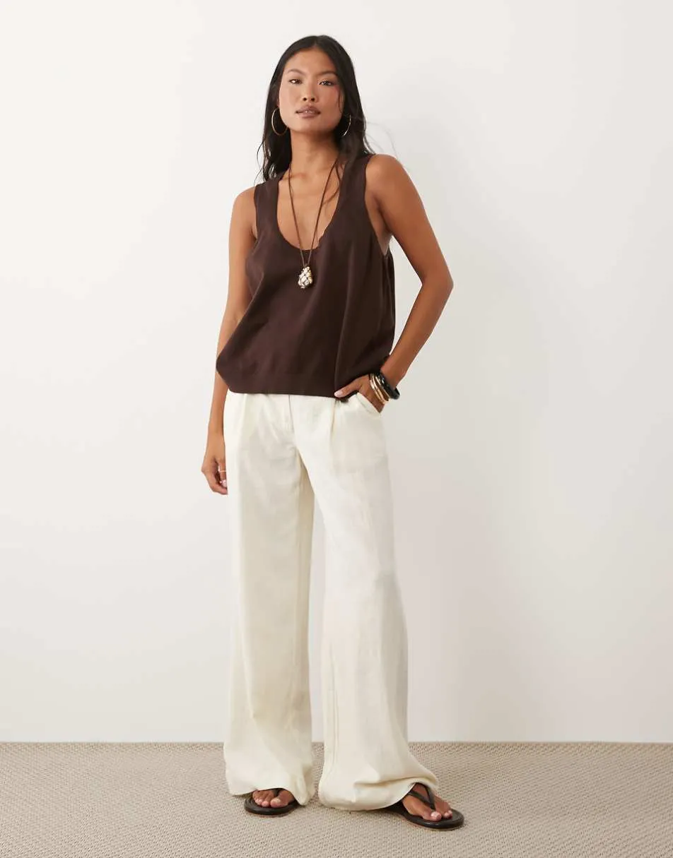 ASOS DESIGN Petite wide leg trousers with pleat detail in linen blend in cream