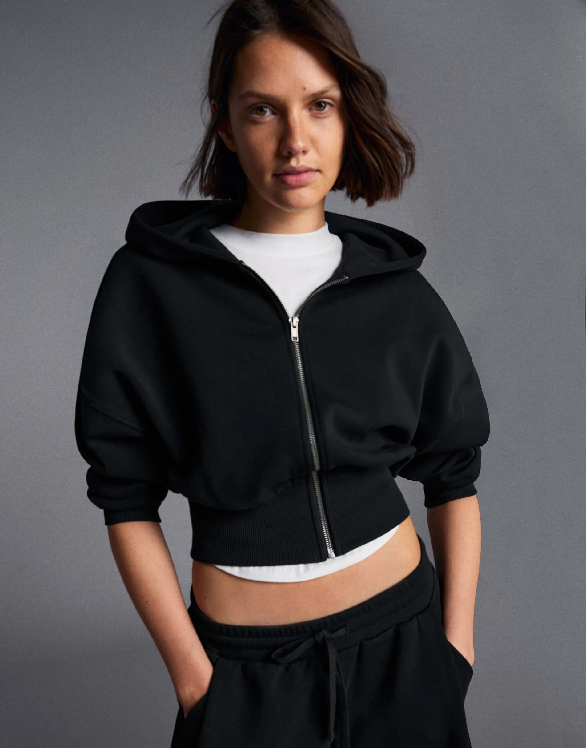 Bershka Zip-up hooded sweatshirt with sash in black