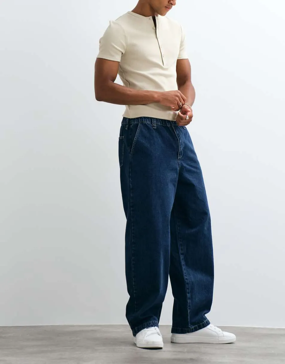 ASOS DESIGN loose straight jeans in mid wash blue with elasticated waist