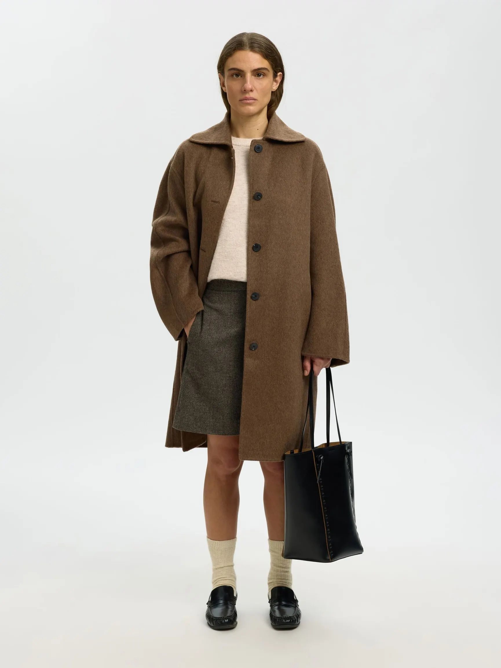 ULLBLANDING STRIKKET VEST