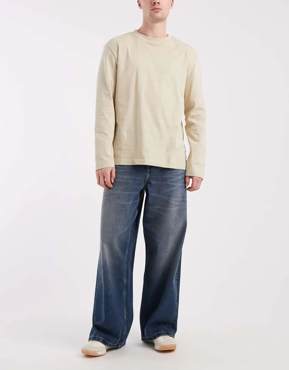 ASOS DESIGN loose jeans in stone wash blue