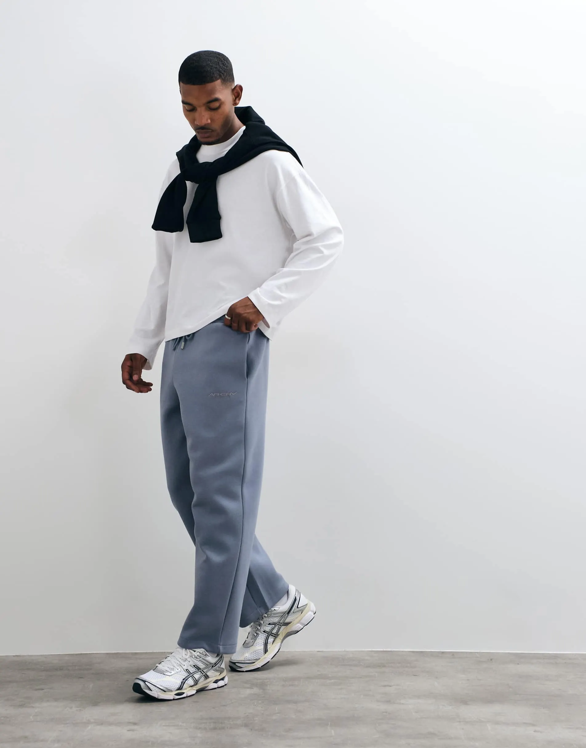 ASOS DESIGN wide leg scuba-style fabric jogger with embroidery in blue