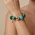 Armband in edelstaal, grote gekleurde kralen