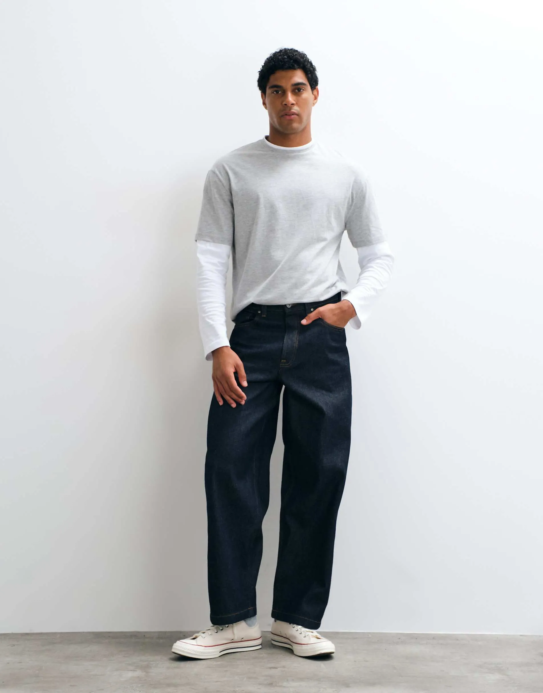 ASOS DESIGN loose jeans in raw indigo