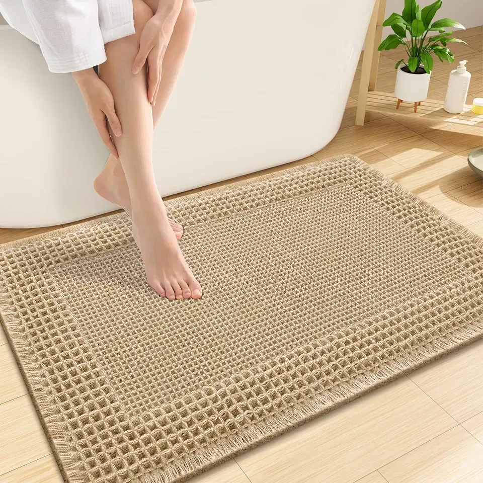 Smiry Waffle Bath Mat 32x20, Extra Soft Absorbent Bathroom Rugs, Non Slip Machine Washable Quick Dry Boho Bath Rugs with Tassels for Bathroom Floor, Tub, Shower, Brown