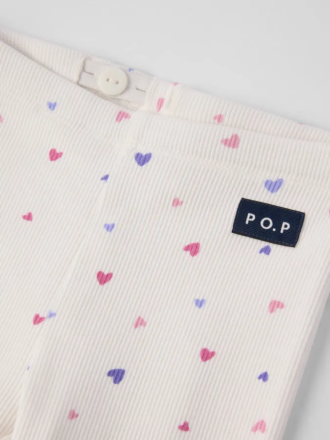 Ribbestrikket i myk bomull med bølget kant