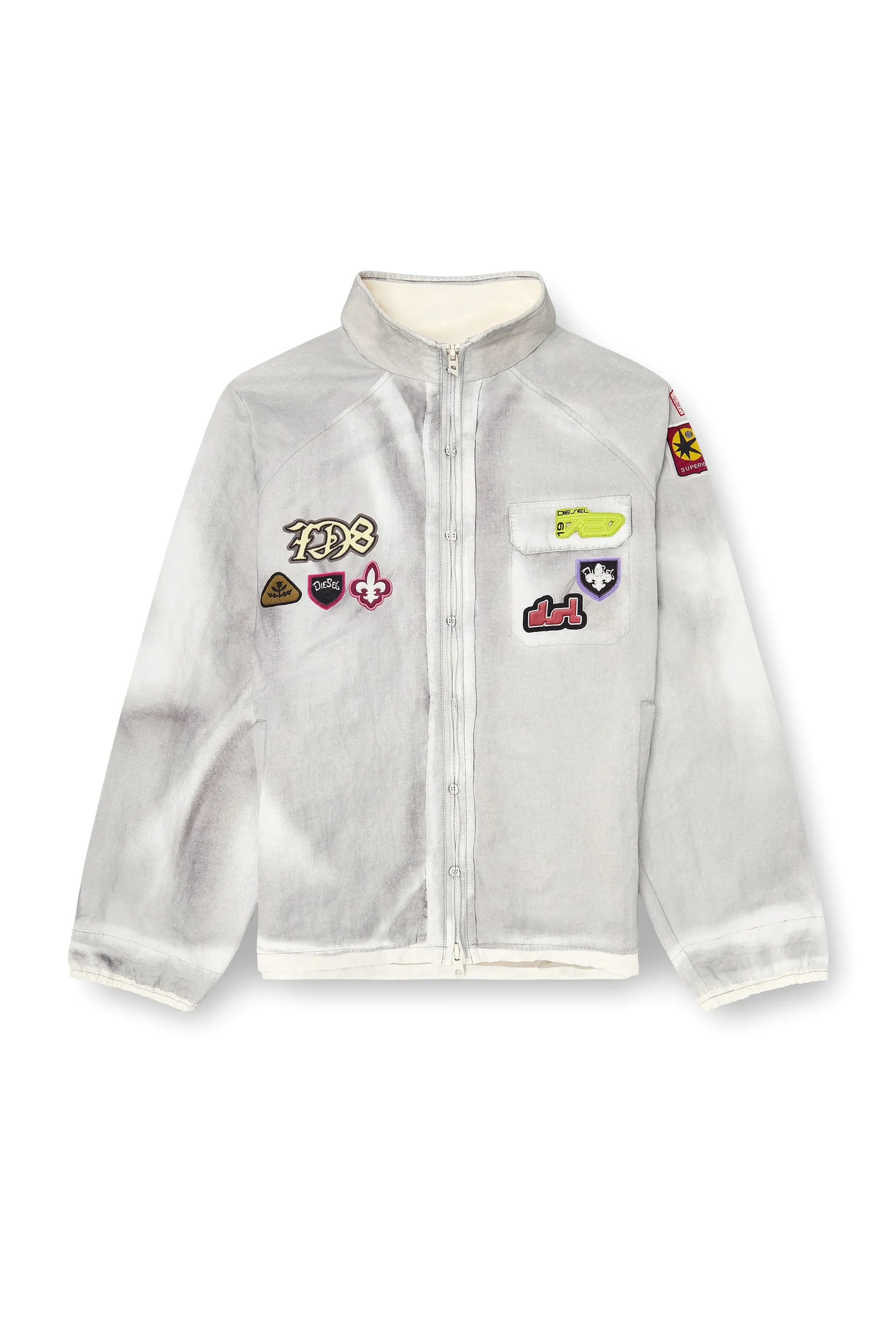 Windbreaker with trompe l’oeil patches