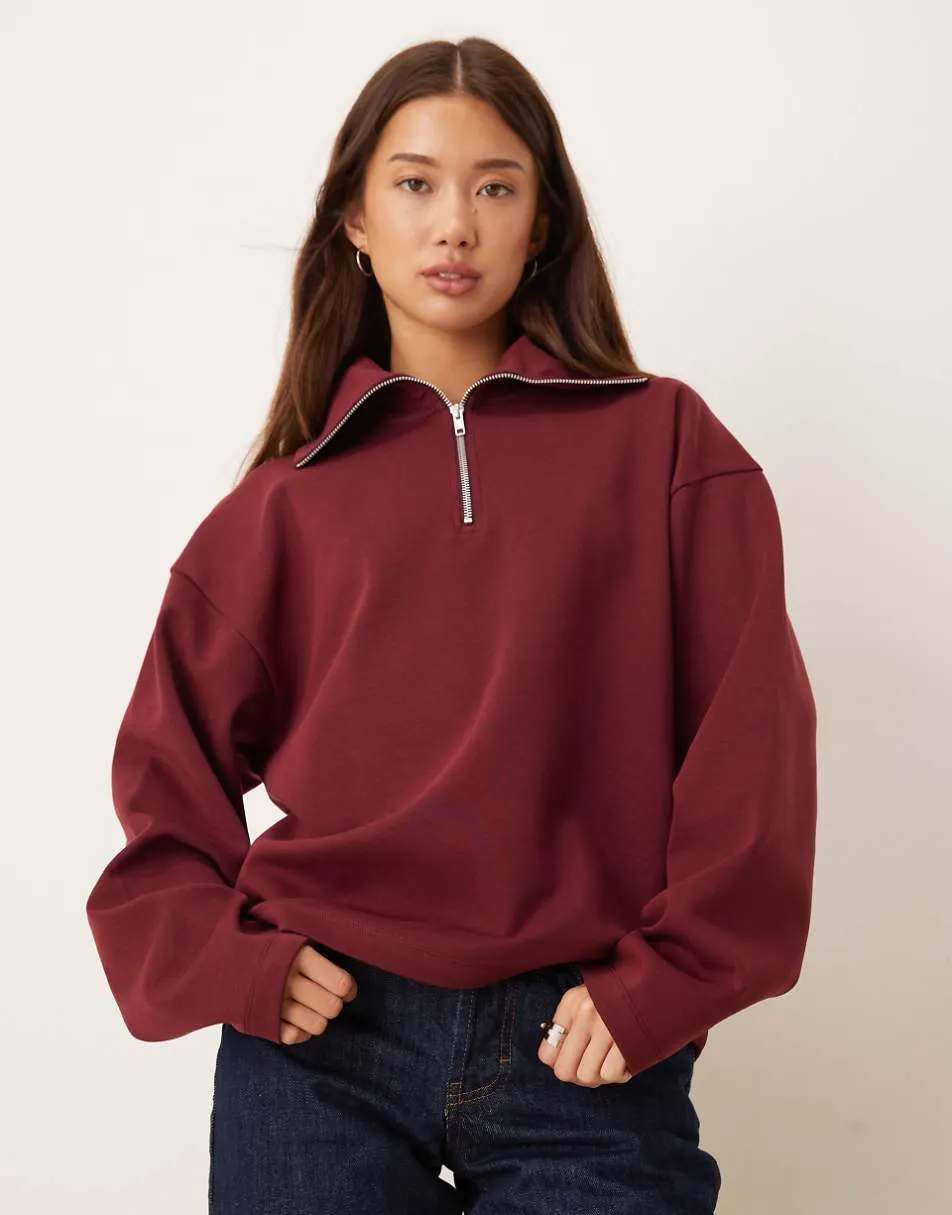 ASOS DESIGN interlock half zip sweatshirt in burgundy