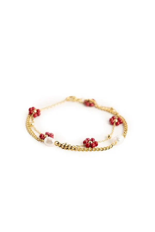 Goudkleurige dubbele armband met bloemen