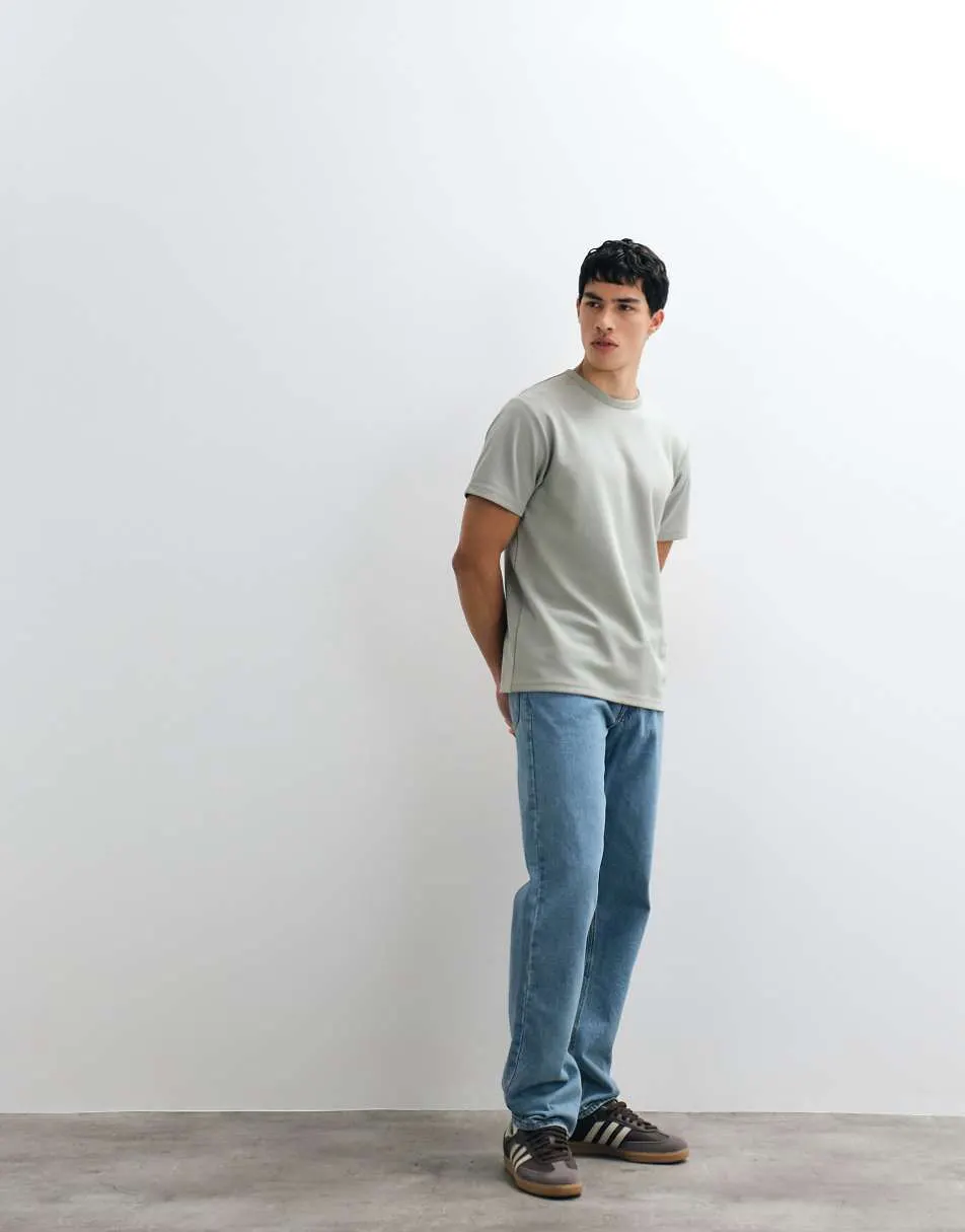 ASOS DESIGN straight leg jeans in light wash blue