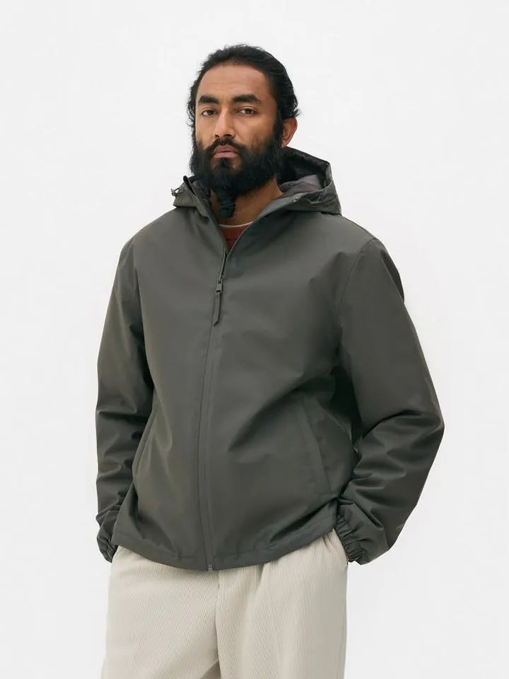 Manteau imperméable à capuche