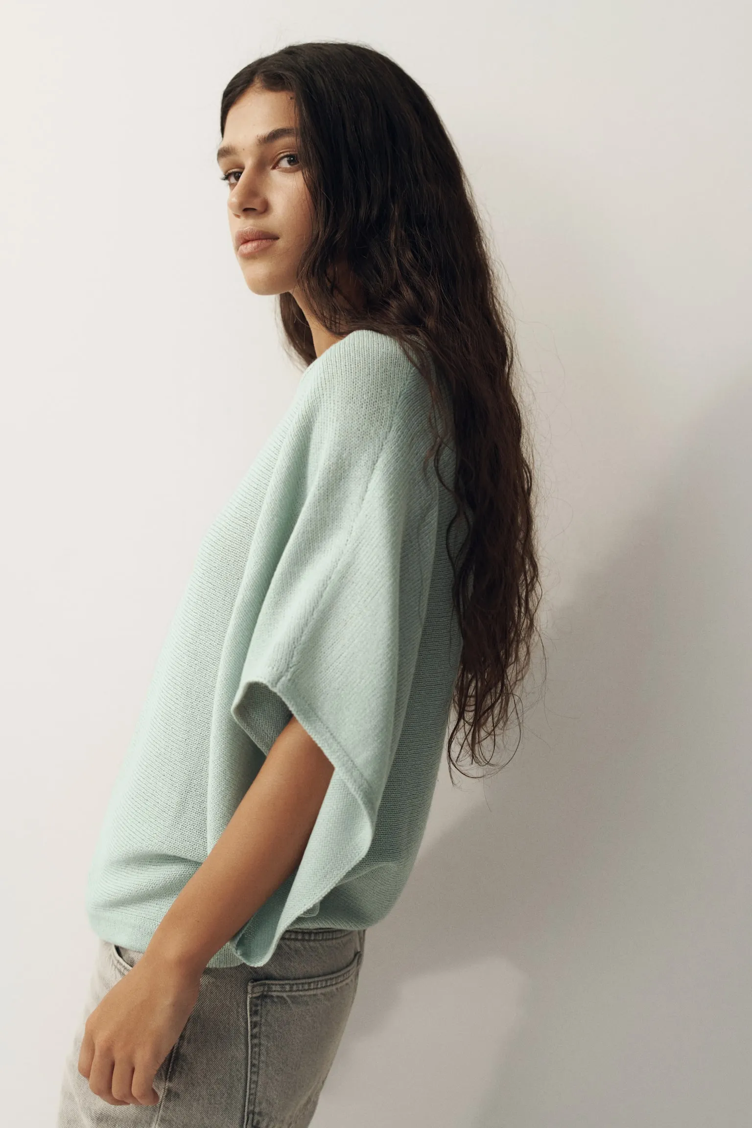 Batwing-sleeved knitted top