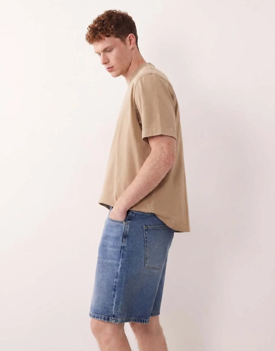 ASOS DESIGN mid length denim jorts in mid washed blue