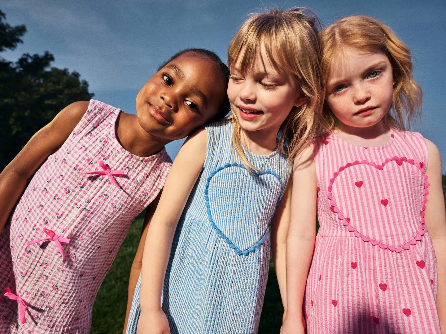 STRIPED DRESS WITH HEART APPLIQUÉ