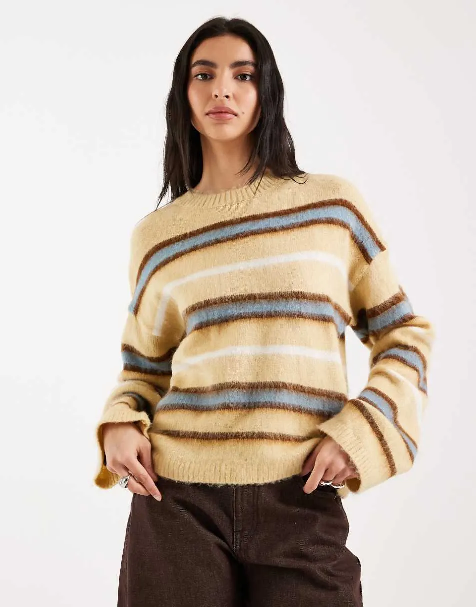 Vero Moda knitted crew neck jumper in yellow multi stripe