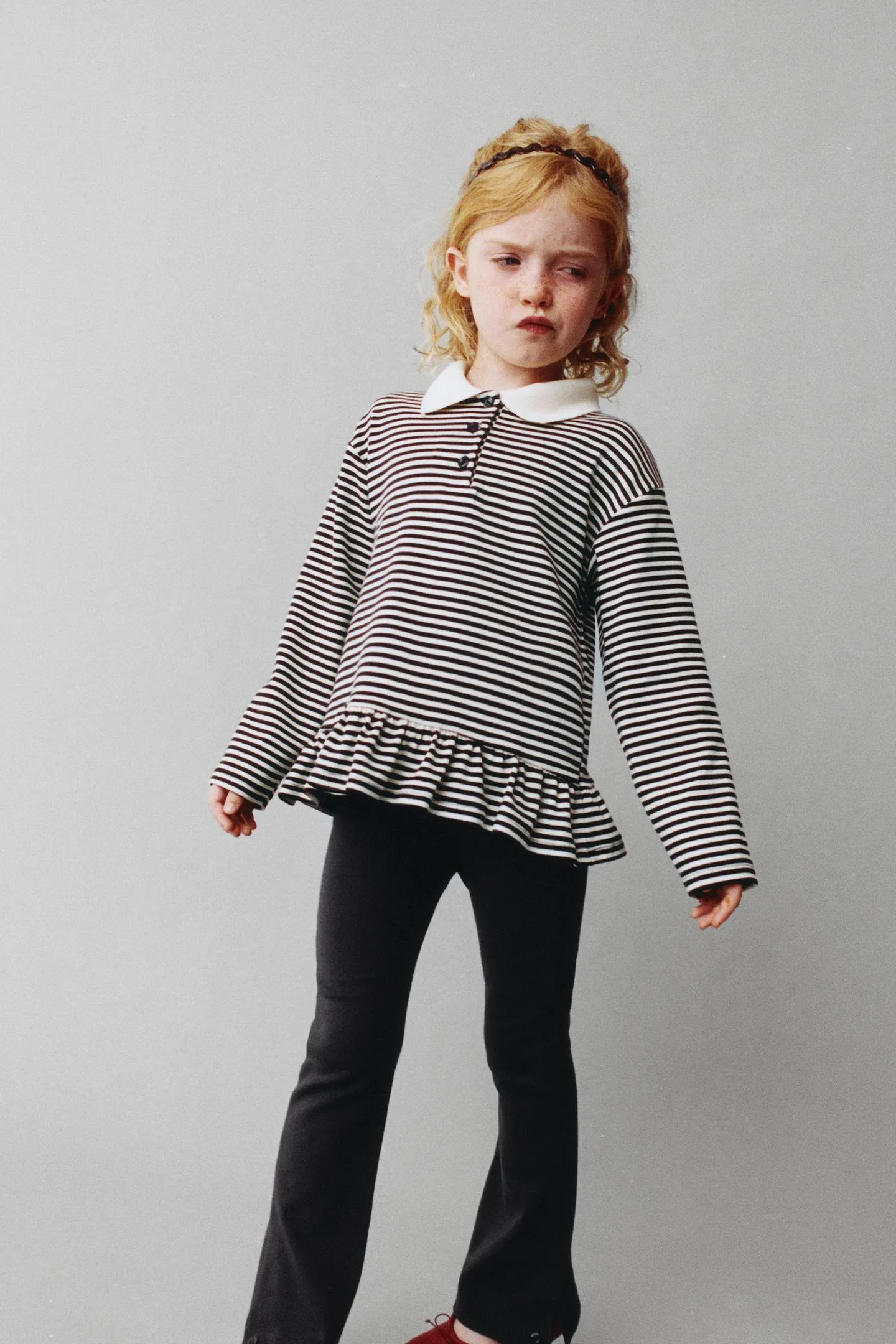STRIPED PEPLUM POLO SHIRT
