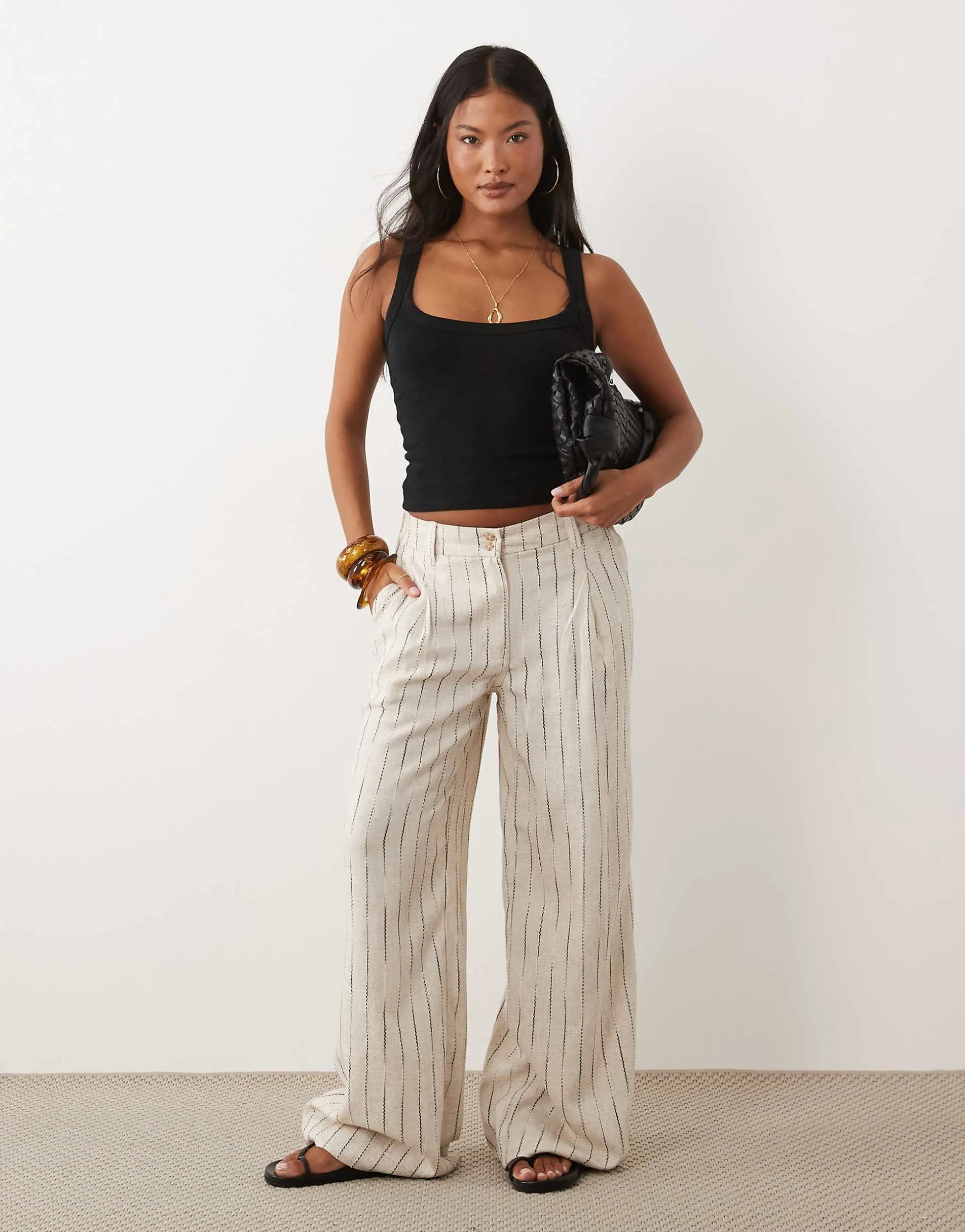 ASOS DESIGN Petite wide leg trousers with pleat detail in linen blend in natural squiggle