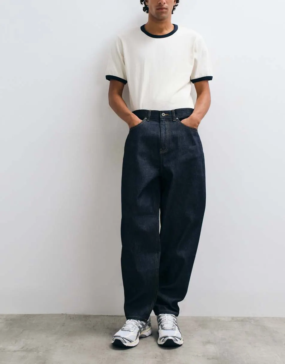 ASOS DESIGN relaxed tapered jeans in raw indigo