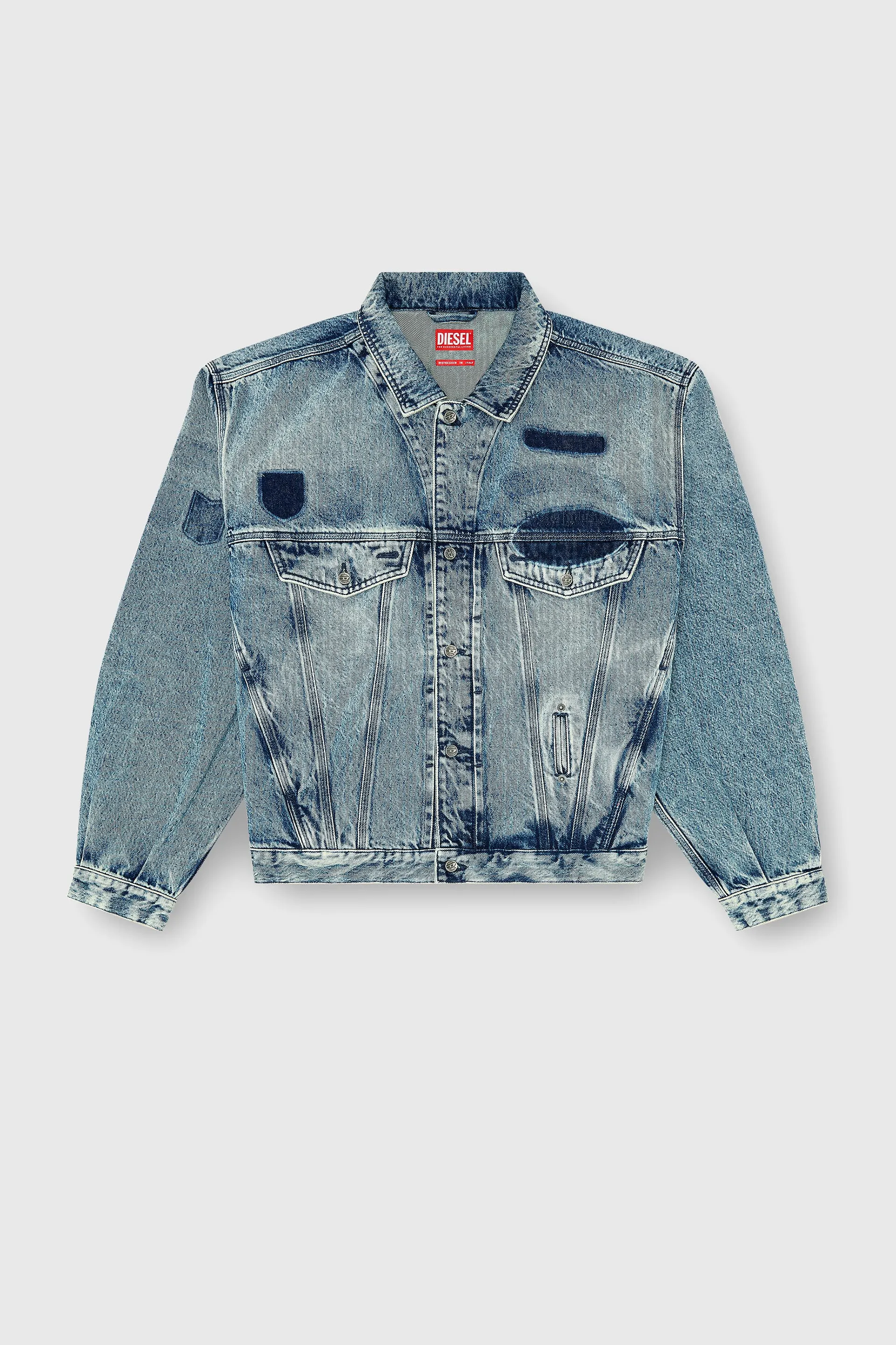 Trucker jacket with patch effects