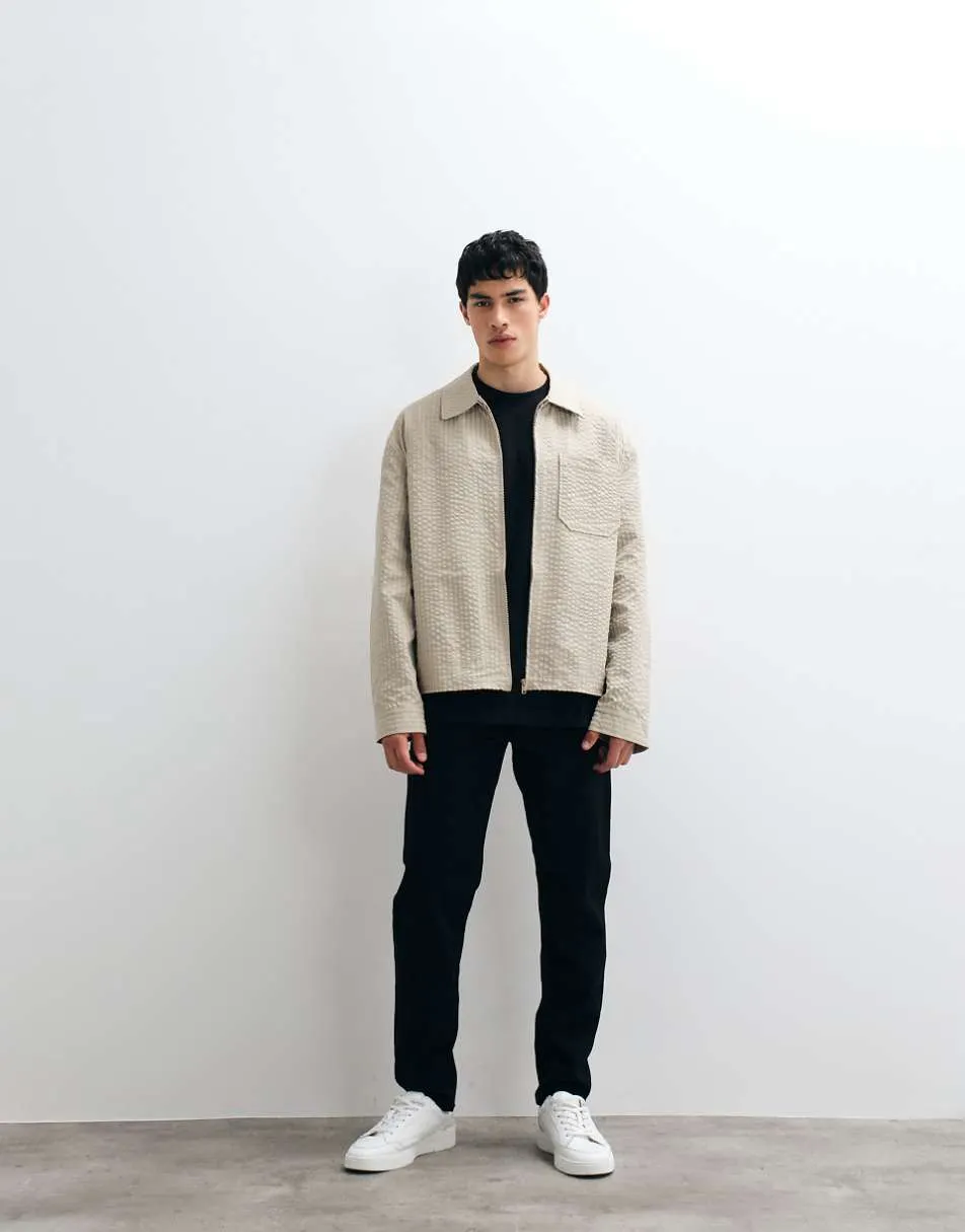 ASOS DESIGN tapered jeans in black