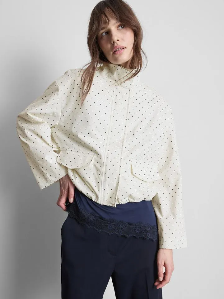 Veste à pois et col cheminée