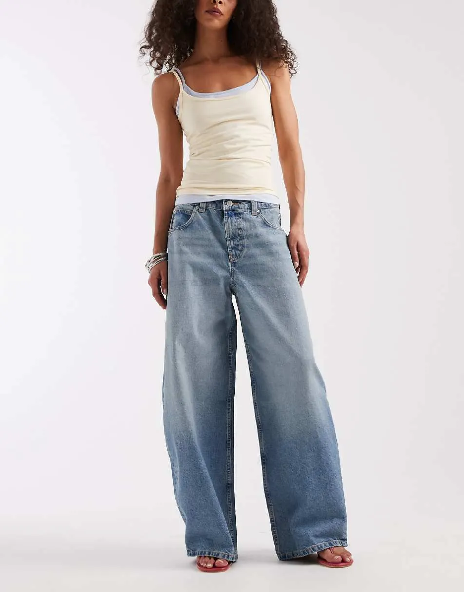ASOS DESIGN baggy horseshoe jean in light mid wash