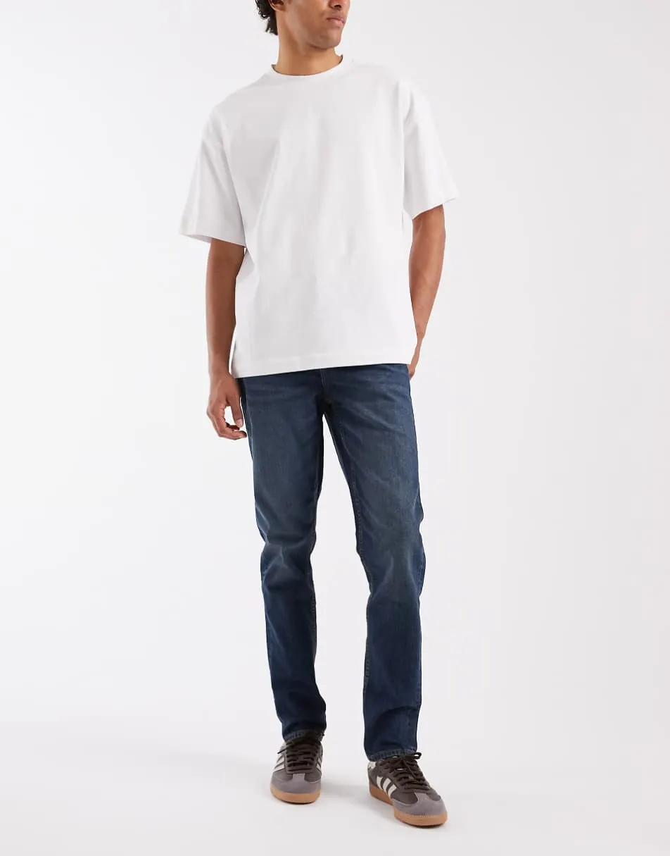 ASOS DESIGN skinny jeans in dark wash blue