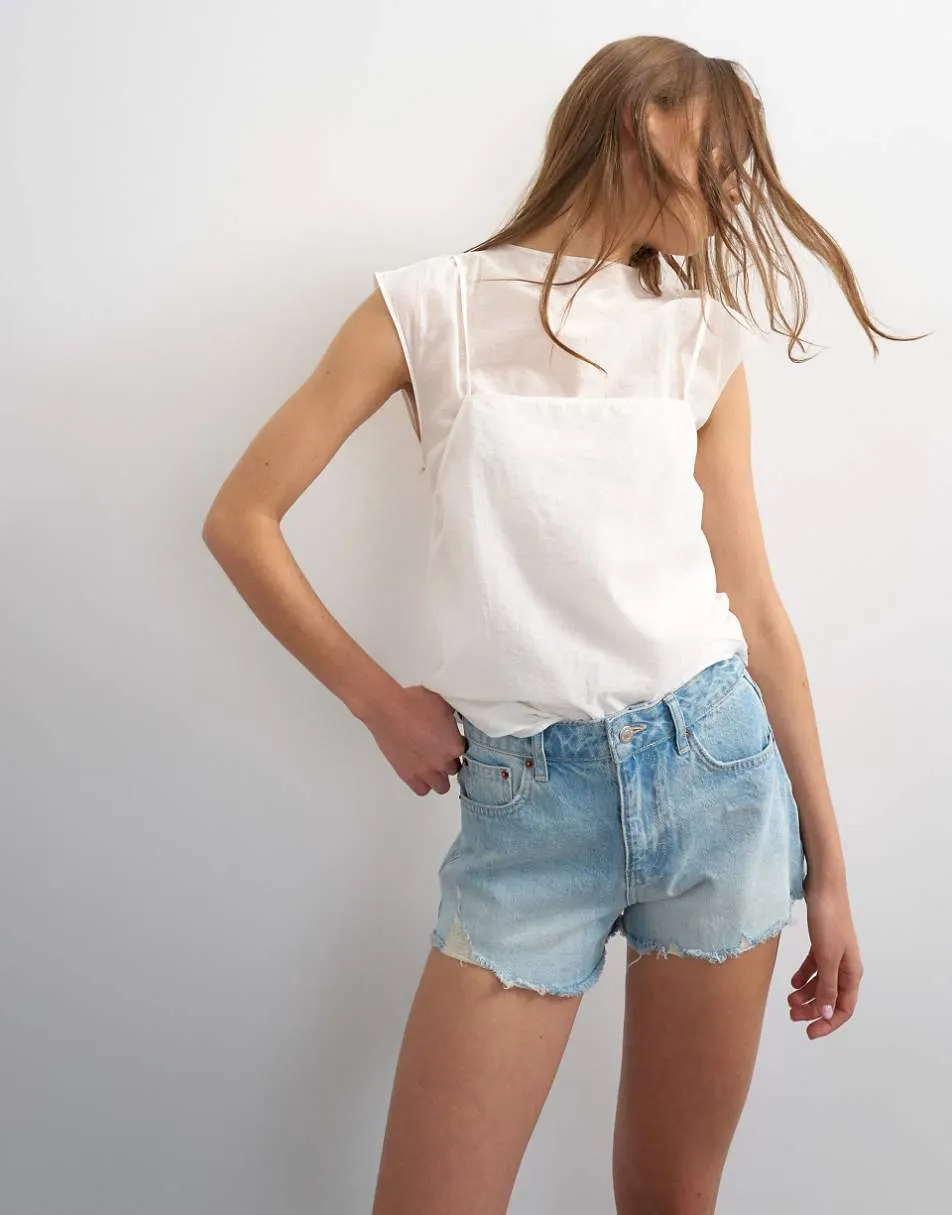 Topshop denim A-line short with rip in bleach
