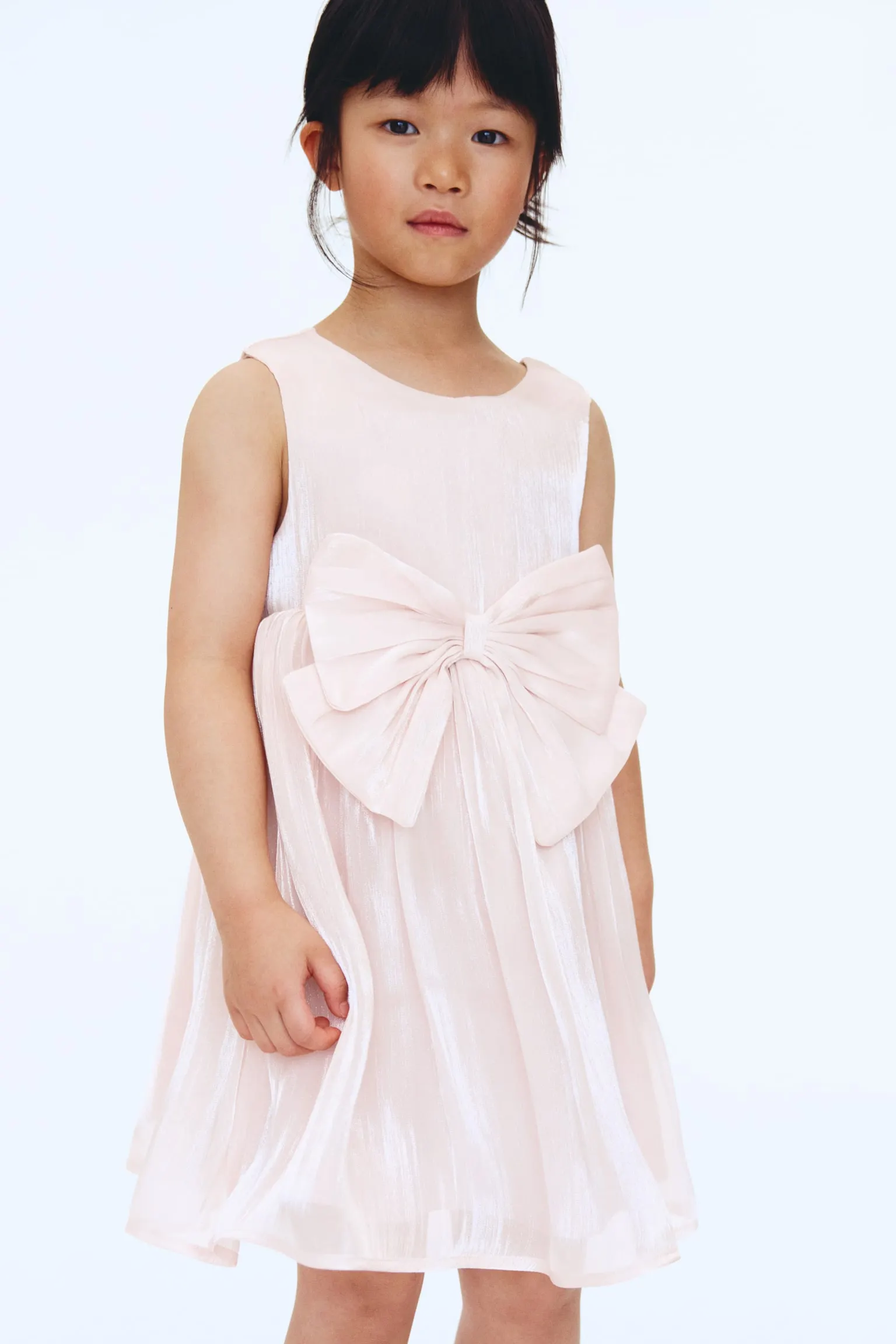 Vestido de organza con moño