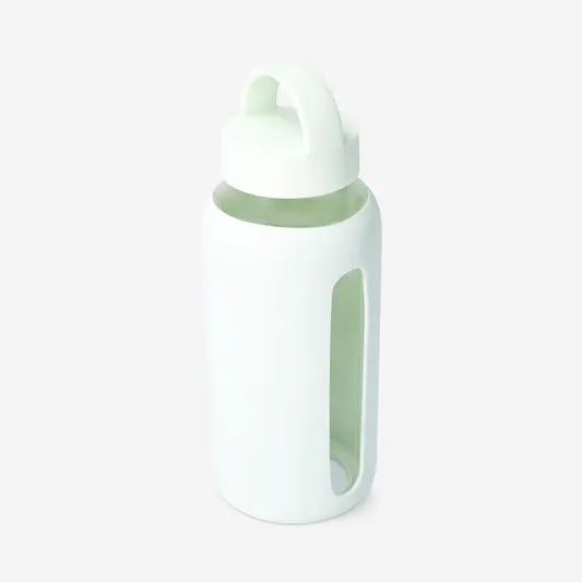 Green glass drinking bottle with ...