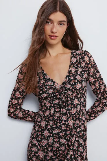 Vestido midi flores escote lazo